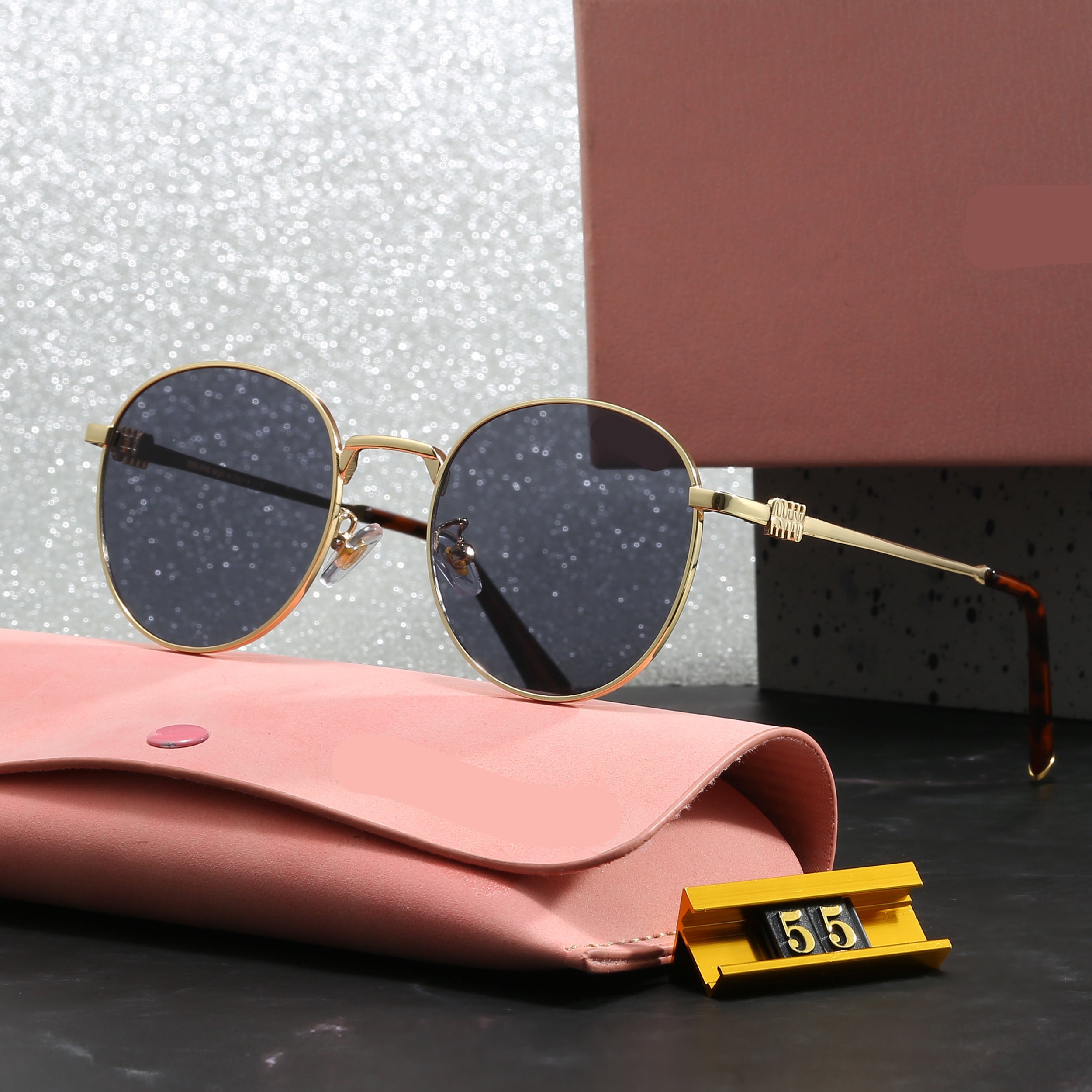 Miu Miu Round Sunglasses