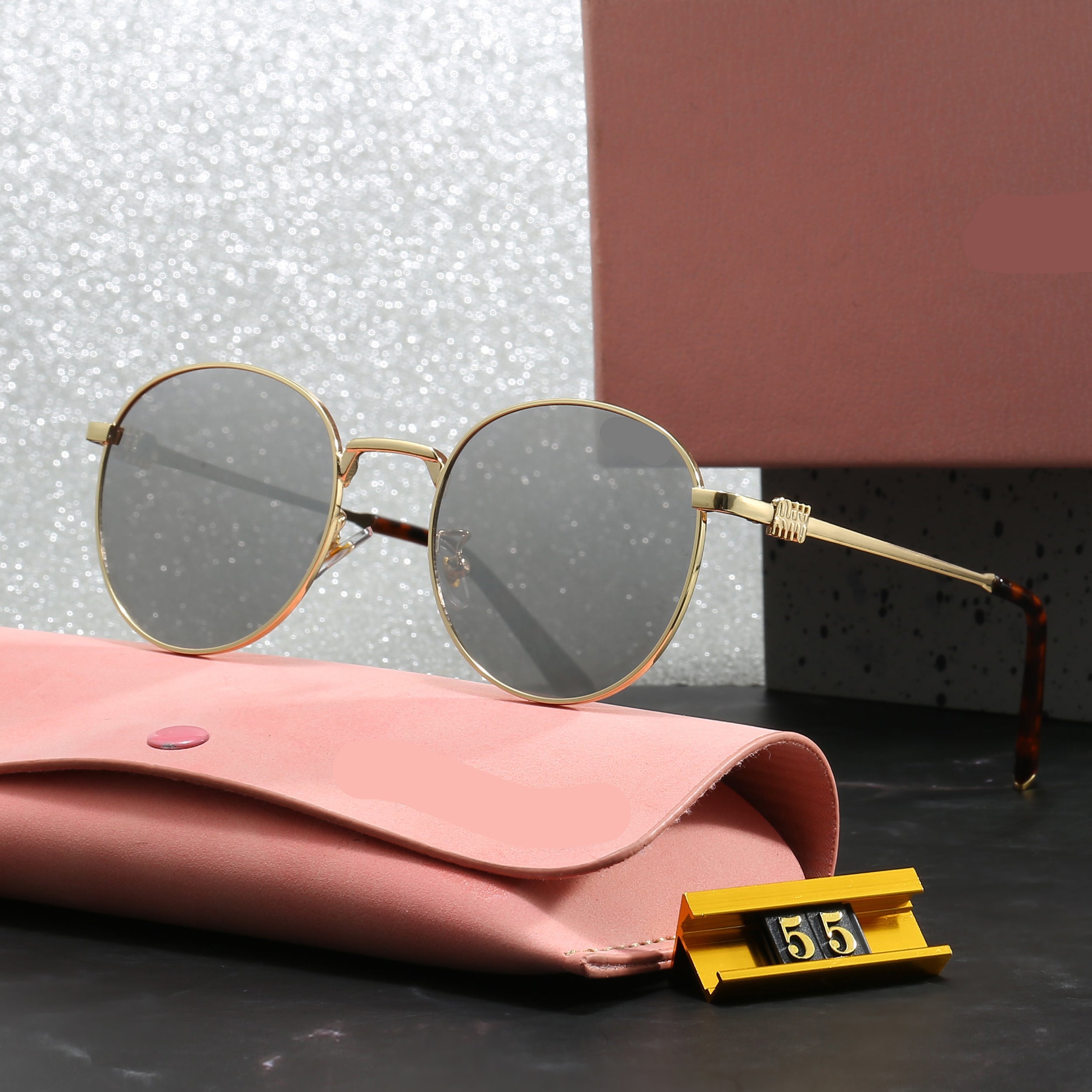 Miu Miu Round Sunglasses