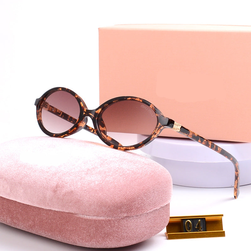 Miu Miu Regard Sunglasses
