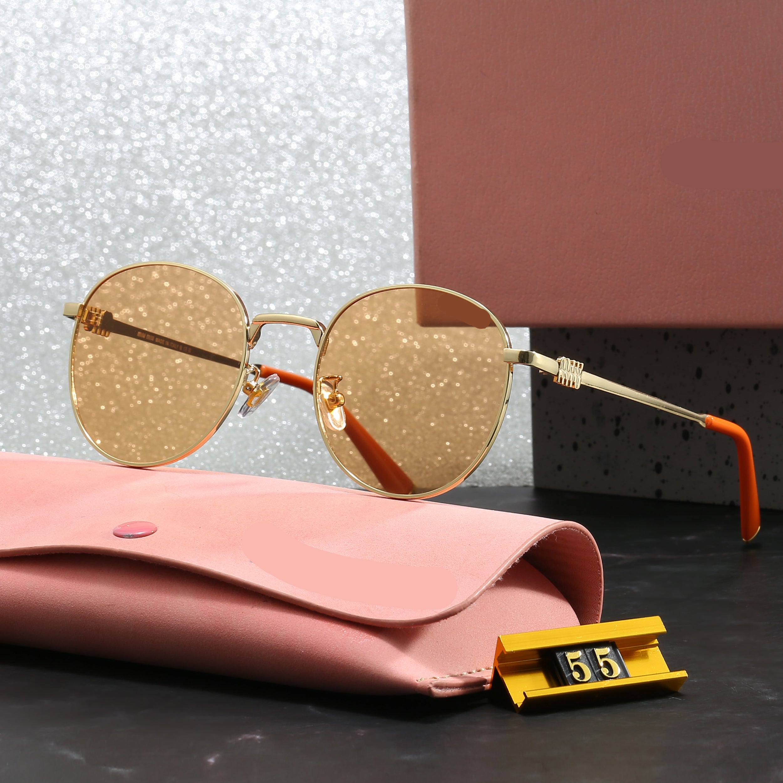Miu Miu Round Sunglasses